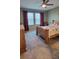Bedroom with king-sized bed and ceiling fan at 648 Daring Dr, Davenport, FL 33837