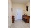 Entryway with tiled floor and piano at 648 Daring Dr, Davenport, FL 33837