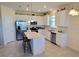 Modern kitchen with stainless steel appliances and an island at 648 Daring Dr, Davenport, FL 33837