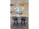 Kitchen island with seating for two at 648 Daring Dr, Davenport, FL 33837