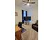 Home office with a desk, chair, and TV at 648 Daring Dr, Davenport, FL 33837
