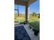 Screened porch with potted plants at 648 Daring Dr, Davenport, FL 33837