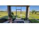 Screened porch overlooking a backyard at 648 Daring Dr, Davenport, FL 33837