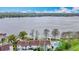 Stunning waterfront condo featuring a pool and private dock, complemented by beautiful lake and city views at 660 Killarney Bay Ct # 6, Winter Park, FL 32789