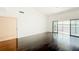Bright bedroom with access to a balcony with a water view at 660 Killarney Bay Ct # 6, Winter Park, FL 32789