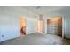 Spacious bedroom with a walk-in closet and adjacent bathroom at 660 Killarney Bay Ct # 6, Winter Park, FL 32789