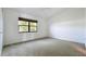 Bright bedroom featuring a ceiling fan and a window with a view at 660 Killarney Bay Ct # 6, Winter Park, FL 32789