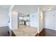 Bright kitchen features white cabinets, stainless steel appliances, and tile flooring at 660 Killarney Bay Ct # 6, Winter Park, FL 32789
