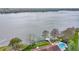 Aerial view of the condo overlooking the lake with the community pool and boat dock at 660 Killarney Bay Ct # 6, Winter Park, FL 32789