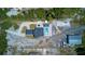 Overhead view of house, pool, and detached garage at 711 Cypress Ave, Orange City, FL 32763