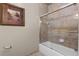 Bathroom with a shower/tub combo and tile surround at 8020 Tuscany Way # 6401, Davenport, FL 33896