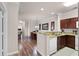 Open kitchen with granite counters and stainless steel appliances at 8020 Tuscany Way # 6401, Davenport, FL 33896