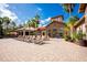 Inviting pool area with lounge chairs and umbrellas, ideal for relaxation and leisure at 8020 Tuscany Way # 6401, Davenport, FL 33896