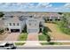Two-story house with solar panels and double car garage at 828 Scrub Oak Hammock Rd, Davenport, FL 33837
