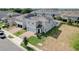 Two-story house with solar panels and a large backyard at 828 Scrub Oak Hammock Rd, Davenport, FL 33837