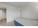 Small bedroom with an air mattress and neutral wall colors at 828 Scrub Oak Hammock Rd, Davenport, FL 33837