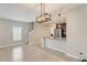 Kitchen with granite counters, dark wood cabinets, and stainless steel appliances at 828 Scrub Oak Hammock Rd, Davenport, FL 33837