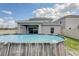 Above ground pool with solar panels on house visible at 828 Scrub Oak Hammock Rd, Davenport, FL 33837