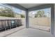 Covered patio overlooks a fenced backyard with an above ground pool at 828 Scrub Oak Hammock Rd, Davenport, FL 33837