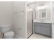 Clean bathroom with a toilet, vanity, and a shower stall at Tbd Marion Oaks Ln, Ocala, FL 34473