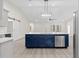 Open concept kitchen with a large island and stainless steel appliances at Tbd Marion Oaks Ln, Ocala, FL 34473
