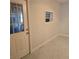 Clean basement with terrazzo floors and new exterior doors and windows at 1026 Lake Jessamine Dr, Orlando, FL 32839