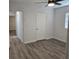 Bedroom boasts new floors, neutral paint and ceiling fan at 1026 Lake Jessamine Dr, Orlando, FL 32839