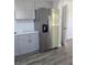 Kitchen with stainless steel refrigerator and white countertops at 1026 Lake Jessamine Dr, Orlando, FL 32839