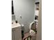 Simple bathroom with a toilet and vanity at 110 Country Club Cir, Sanford, FL 32771