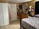 Bedroom with a double bed and mirrored dresser at 110 Country Club Cir, Sanford, FL 32771