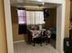 Small dining area with table and chairs, suitable for a small Gathering at 110 Country Club Cir, Sanford, FL 32771