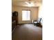 Bedroom featuring a ceiling fan, window, and vintage furniture at 1313 S Pine Ridge Cir # C1, Sanford, FL 32773