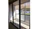 Enclosed lanai with sliding glass doors, blinds, and outdoor carpeting at 1313 S Pine Ridge Cir # C1, Sanford, FL 32773