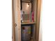 This closet contains an air handler, water heater and shelving at 1313 S Pine Ridge Cir # C1, Sanford, FL 32773
