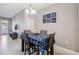 Small dining area with table and chairs at 15407 Blackbead St, Winter Garden, FL 34787