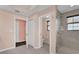 Bathroom featuring walk-in shower and open doorway to toilet and vanity areas at 16737 Meadows St, Clermont, FL 34714