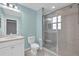 Stylish bathroom with a glass shower, and a modern vanity at 16737 Meadows St, Clermont, FL 34714
