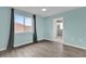 Bedroom with luxury vinyl plank flooring and a window at 16737 Meadows St, Clermont, FL 34714