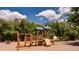 A community playground with various play structures for enjoyment at 16737 Meadows St, Clermont, FL 34714