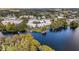 Aerial view of modern townhouses community by the lake at 1762 Mondrian Cir, Winter Park, FL 32789