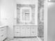 Modern bathroom with marble tile and a large walk-in shower at 1762 Mondrian Cir, Winter Park, FL 32789