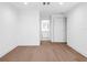Bright bedroom with hardwood floors and access to a modern bathroom at 1762 Mondrian Cir, Winter Park, FL 32789