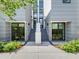 Modern two-story townhouses with gray siding and white accents at 1762 Mondrian Cir, Winter Park, FL 32789