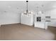 Open concept living and kitchen area with modern lighting at 1762 Mondrian Cir, Winter Park, FL 32789