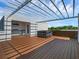 Outdoor kitchen and hot tub on rooftop deck at 1762 Mondrian Cir, Winter Park, FL 32789
