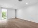 Spacious room with hardwood floors and large window at 1762 Mondrian Cir, Winter Park, FL 32789