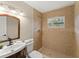 Updated bathroom with a walk-in shower and modern vanity at 219 Nob Hill Cir, Longwood, FL 32779