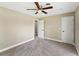 Bright bedroom featuring ceiling fan and neutral wall colors at 219 Nob Hill Cir, Longwood, FL 32779