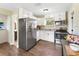 Modern kitchen with stainless steel appliances and granite countertops at 219 Nob Hill Cir, Longwood, FL 32779