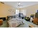 Cozy bedroom with a bed, desk, and ample space at 2395 Windward Cv, Kissimmee, FL 34746